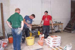 Learn how to mix plaster and apply to a wall